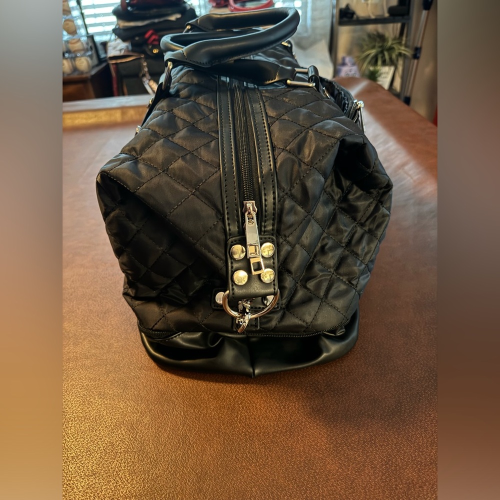 Black carry on bag like new condition with silver hardware